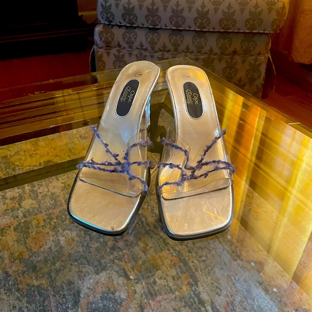 Clear sandals, clear heel, with blue jean details.